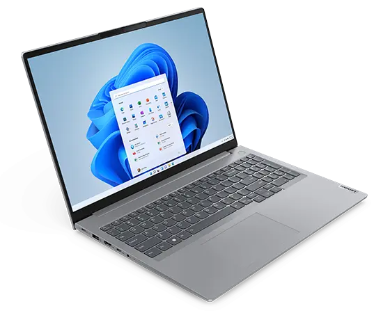 Overhead shot of Lenovo ThinkBook 16 Gen 6 laptop showing display with Windows 11 Start menu, keyboard, & left-side ports & slots.