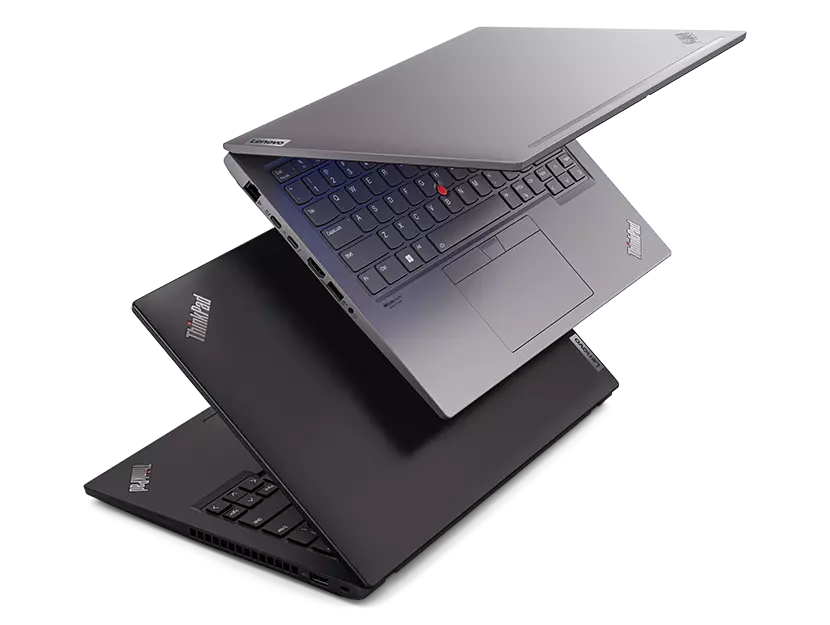 Two Lenovo ThinkPad T series laptops floating, back-to-back, with silver on top & black beneath it.