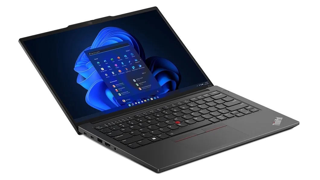 Lenovo ThinkPad E14 Gen 5 (14, AMD) laptop in Graphite Black – front-left view from above, lid open about 135 degrees, with Windows 11 menu on the display