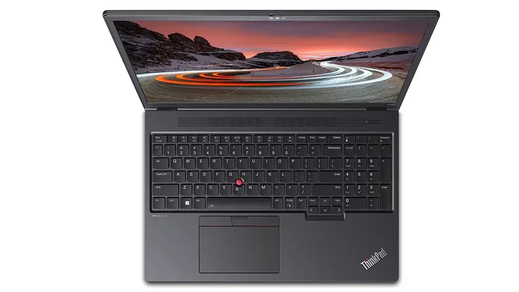 Aerial view of Lenovo ThinkPad P16v (16, Intel) mobile workstation, opened, showing full keyboard & display with Windows 11 start-up screen with a mountain image