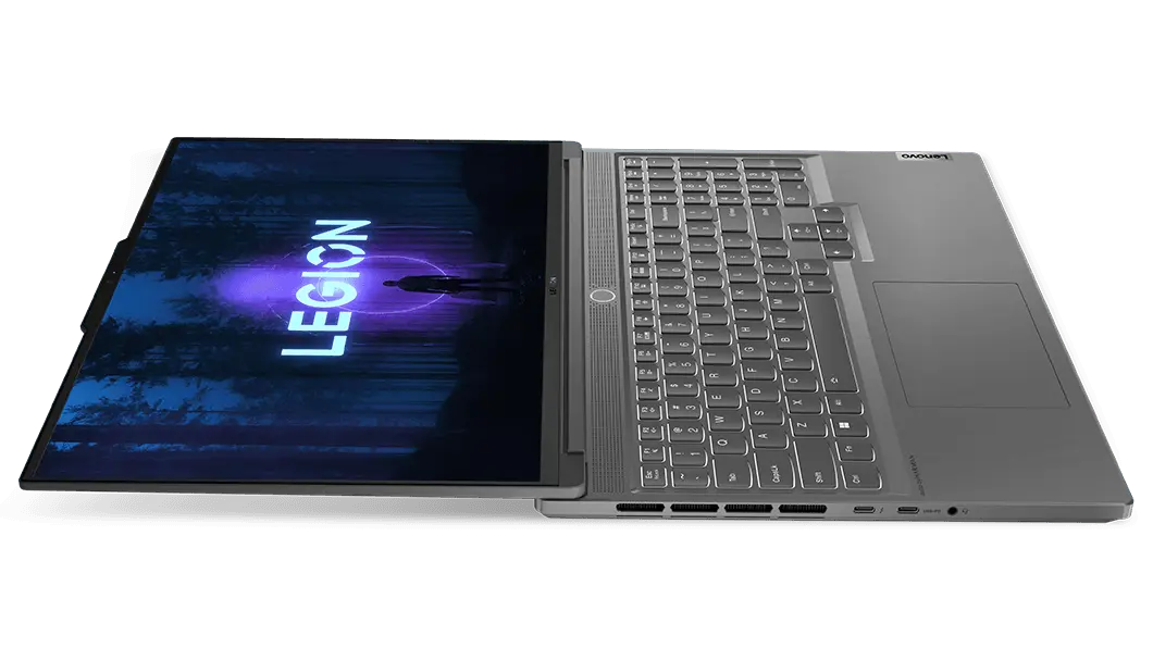 Left view of the Lenovo Legion Slim 7i Gen 8 (16, Intel) laying flat, showing ports, display, keyboard, and touchpad