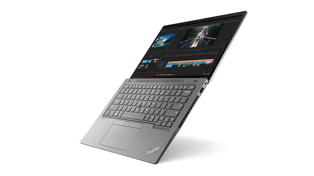 Rear-facing Lenovo ThinkPad T14 Gen 4  laptop in Storm Grey partially open & angled to show right-side ports.