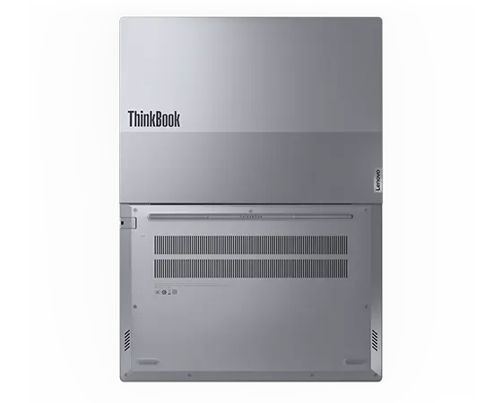 Overhead shot of the Lenovo ThinkBook 14 Gen 6 laptop open 180 degrees, showcasing the dual-toned top cover & bottom with vents.