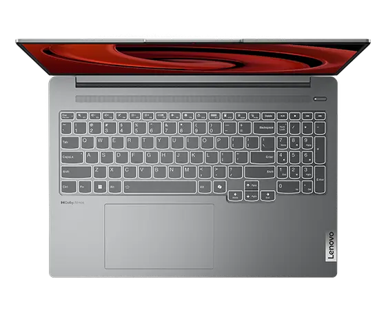 Overhead shot of the Lenovo IdeaPad Pro 5 Gen 9 16 inch AMD laptop with lid open at 90 degrees, focusing its keyboard & speaker.