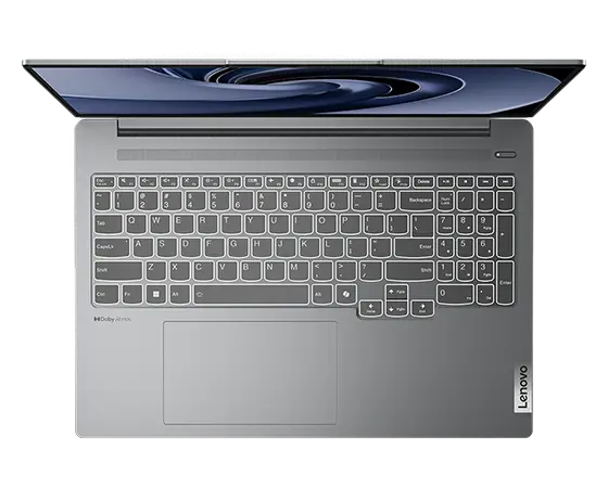 Overhead shot of Lenovo IdeaPad Pro Gen 9 16 inch laptop with lid open 90 degrees, focusing on the speakers and the keyboard.