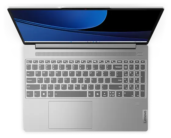 Close-up, top-front view of IdeaPad Slim 5i Gen 9 15&quot; Intel laptop with lid open, showing keyboard and a blue graphic image displayed on the screen.