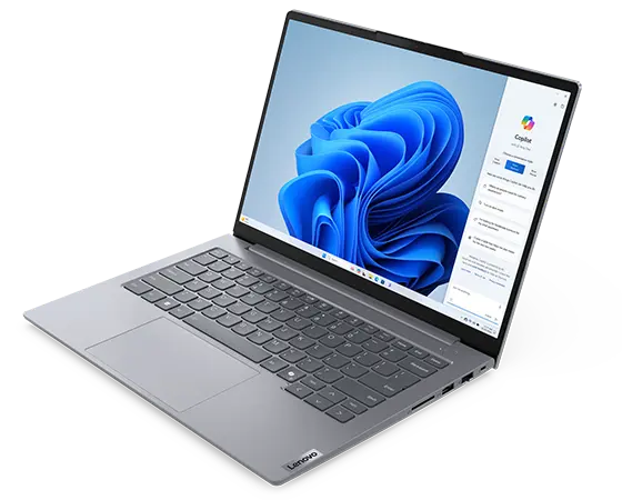 Front, right side view of Lenovo ThinkBook 14 Gen 7 (14 inch Intel) laptop opened at a wide angle, focusing its keyboard & screen with Windows Copilot menu opened on the right side of the screen.