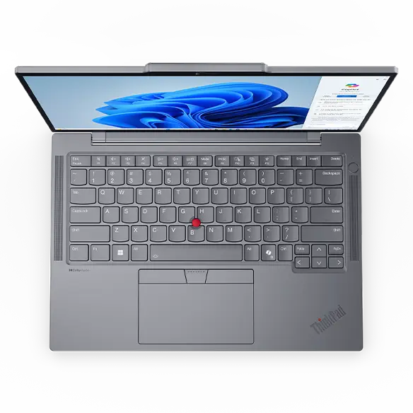 Overhead shot of the Lenovo ThinkPad T14s Gen5 (14'' Intel) Luna Grey laptop opened at 90 degrees, focusing its smooth keycaps, touchpad, & its ThinkPad logo.