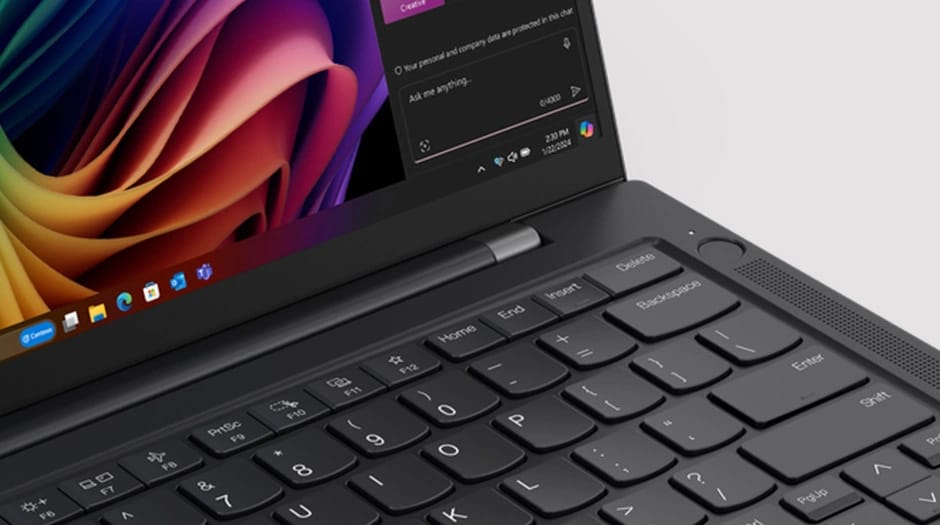 Nahaufnahme des rechten oberen Bereichs der Tastatur des Lenovo ThinkPad T14s Gen 6 Notebooks mit Fingerabdruckscanner über dem Lautsprecher.