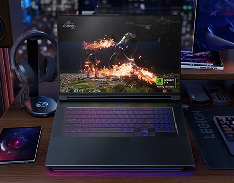 Legion 9i Gen 10 set up on a desk surrounded by Legion accessories.