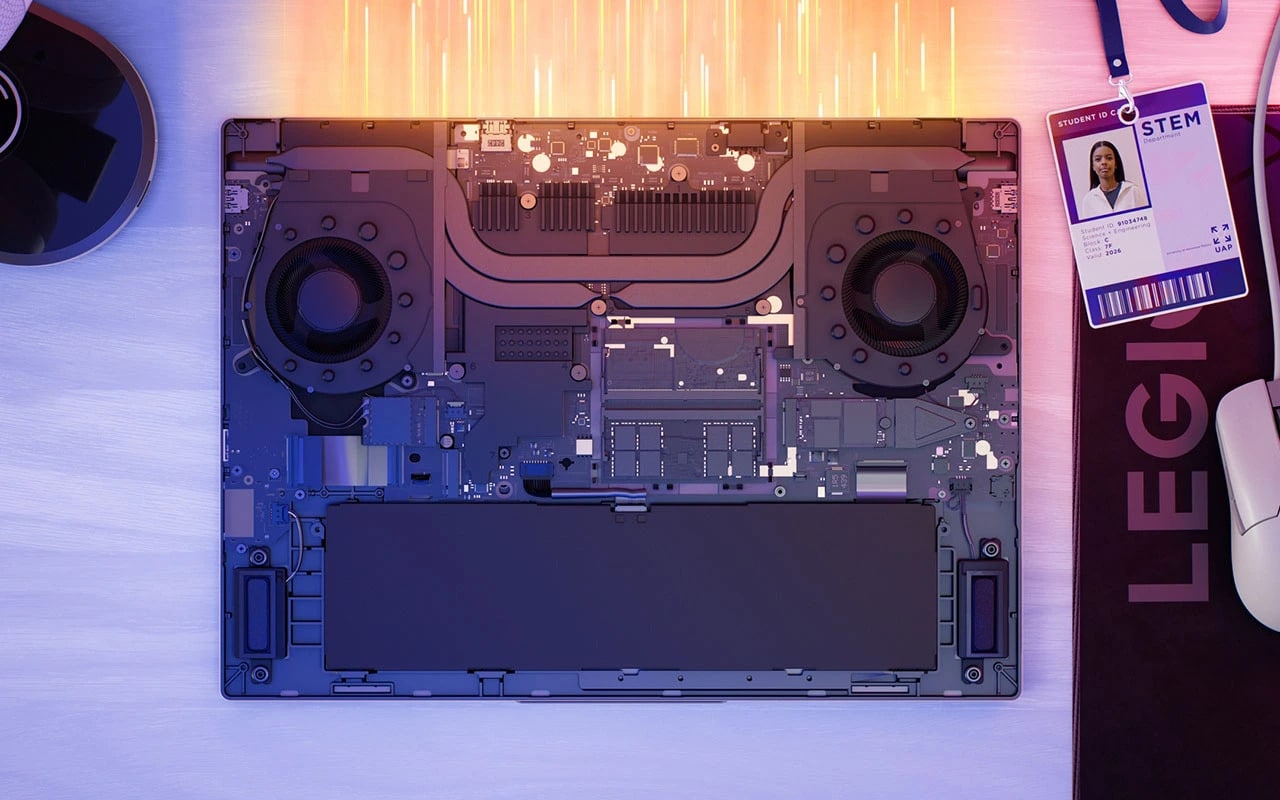 Internal view of Legion 7i Gen 10 with fans, heat pipes, and glowing airflow effects.