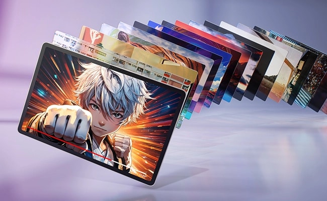 Several Lenovo Yoga Tab tablets are lined up one after another, stretching out in front of you.