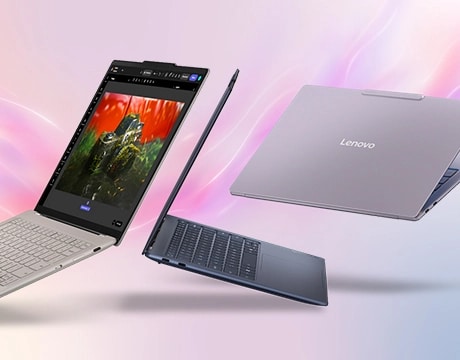 Lenovo Yoga Slim 7i Ultra Gen 11 Aura Edition 14 Three models of the Lenovo Yoga Slim 7i Ultra Gen 11 Aura Edition (14” Intel), in Seashell, Cosmic Blue, and Mystic Violet, float against a pink ribbon.