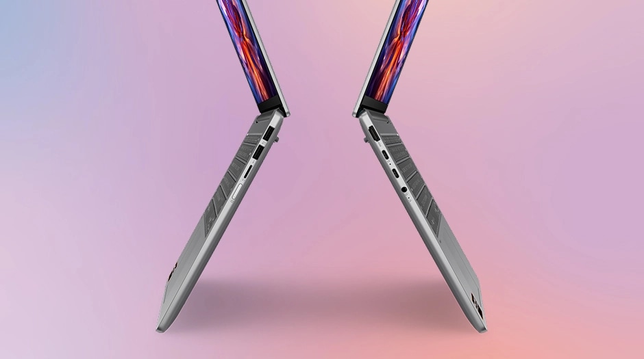 Cut short view of two Lenovo IdeaPad Slim 5a Gen 11 (14" AMD) grey laptops suspended in air back-to-back, featuring their sleek & portable design. מחשב נייד IdeaPad Slim 5 14AHP11 83S3001KIV מבית Lenovo