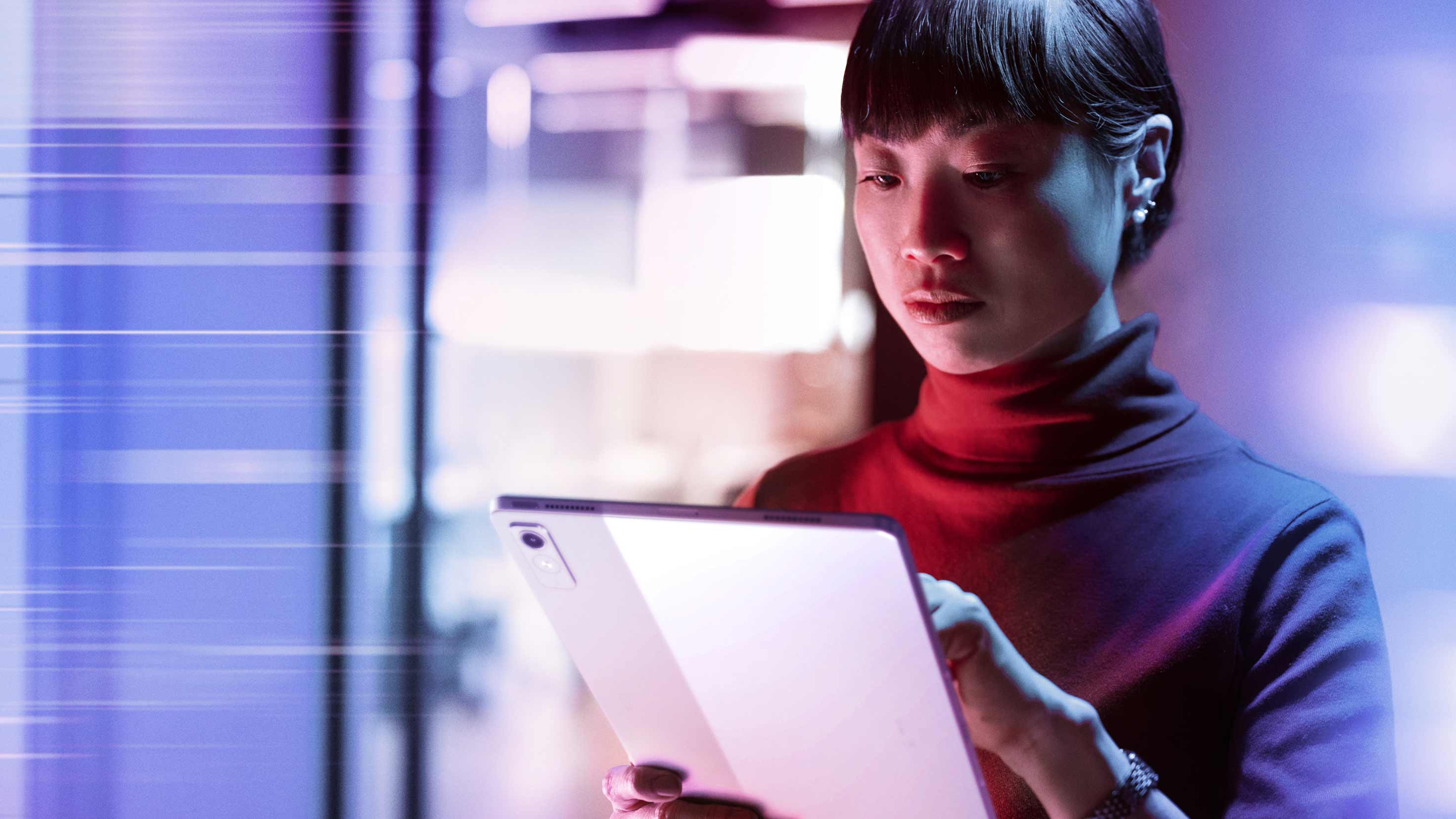 Person using tablet with glowing digital effects symbolizing personal AI interaction.