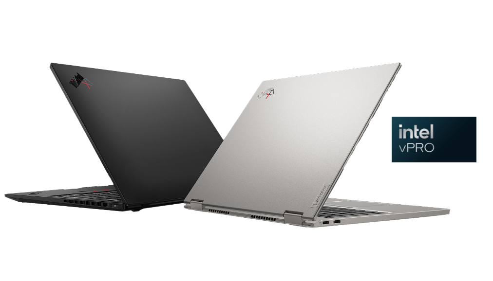 One grey and one black ThinkPad X1 Carbon laptop sit side by side at an angle, each partially opened.