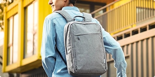 Person wearing Lenovo 15 laptop casual backpack b210