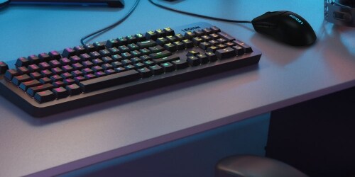 A Legion KM300 RGB Gaming Keyboard and Mouse Combo is featured on a desk.