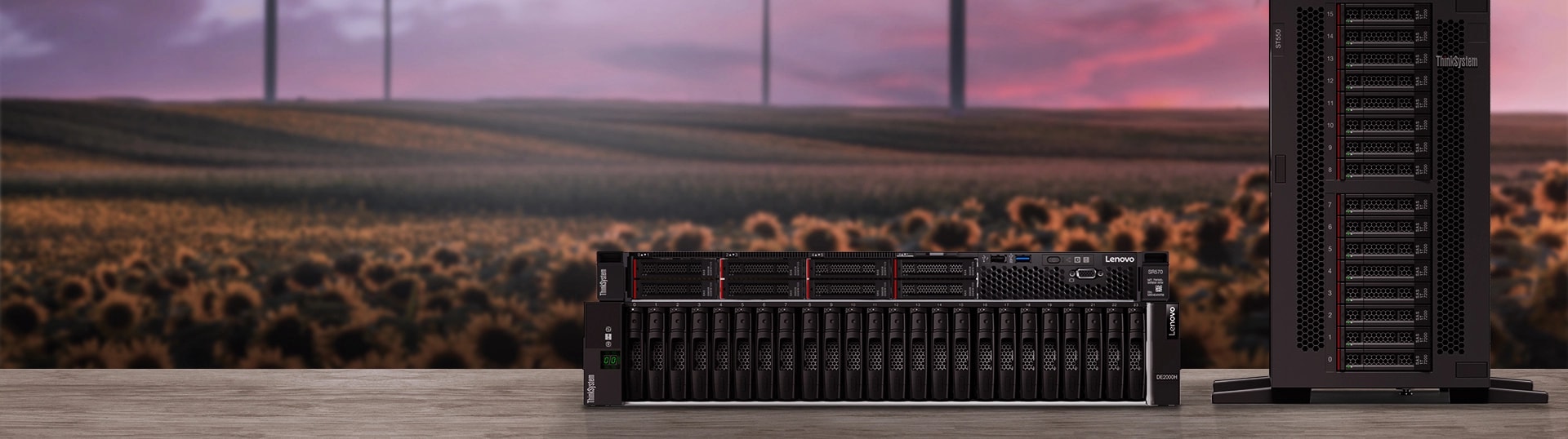 A Lenovo ThinkSystem Tower server, ThinkSystem Rack server and a Storage on a desk. 
