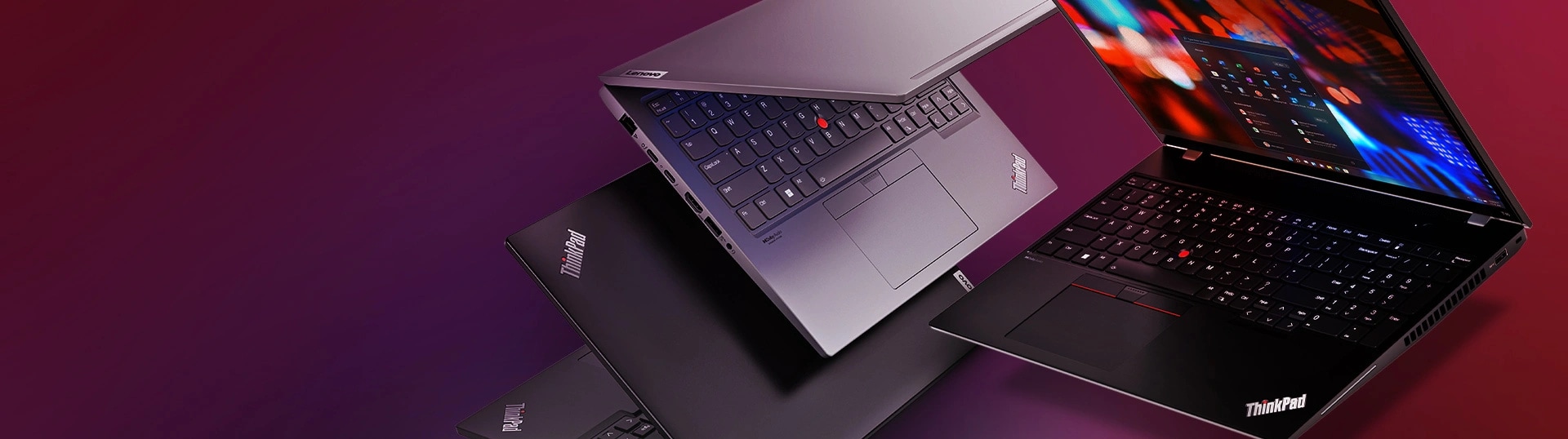 A ThinkPad X1 Yoga Gen 8 and a ThinkPad T14 Gen 3