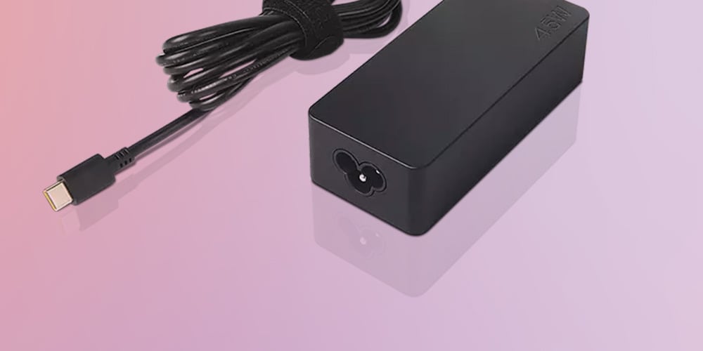 A Lenovo 45W USB-C AC Adapter is featured on a background.