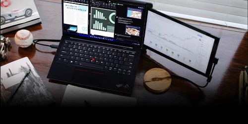 A Mobile Pixels product attached to a ThinkPad X1 Carbon