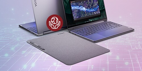 Lenovo Yoga laptop next to and a sleek, gray laptop sleeve