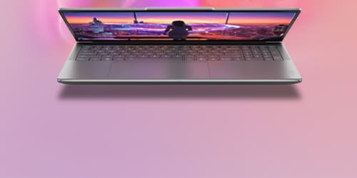 Portable Yoga Pro avec un écran coloré et éclatant. Le portable est ouvert, révélant son clavier, et est mis sur un fond avec des effets de lumière rose doux et pourpre.