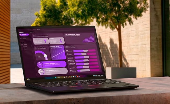 A dashboard appears on the display of the Lenovo ThinkPad T14s Gen 7 (14” Snapdragon) laptop resting on a concrete ledge.