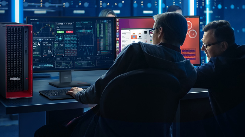 Two people working with Lenovo ThinkStation P5 Gen 2 (Intel) tower workstation, using multiple monitors for data-heavy tasks.