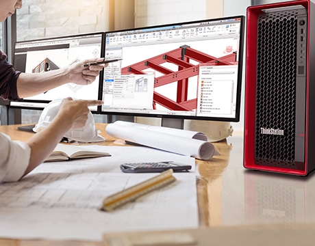 Engineers collaborate on CAD designs with dual monitors connected with the Lenovo ThinkStation P5 Gen 2 (Intel) tower.