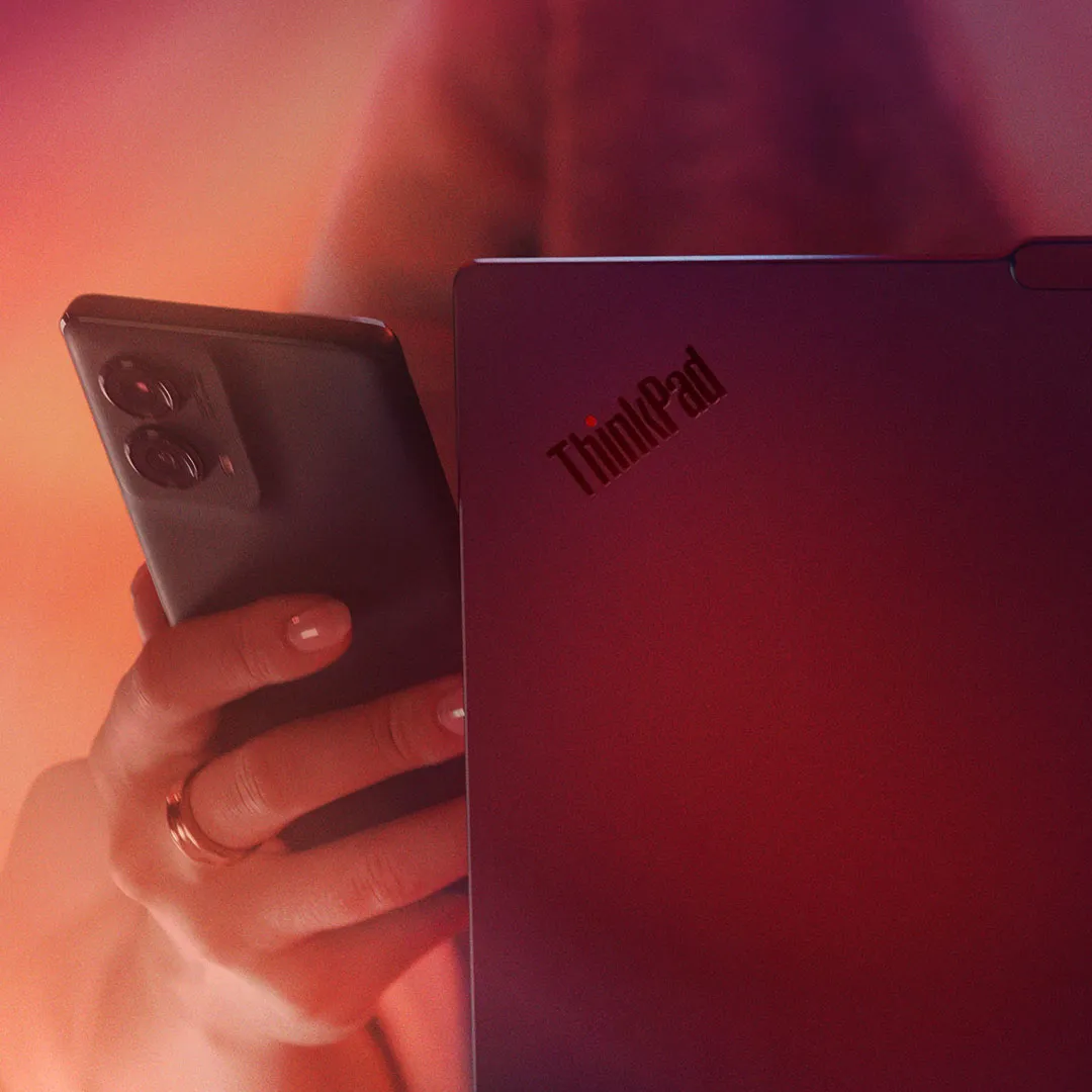 A person using Smart Share to send files between their phone and laptop