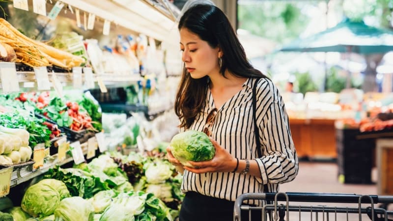A shopper in a grocery store