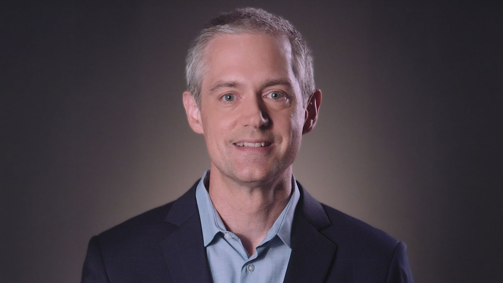 Tom Butler’s headshot.