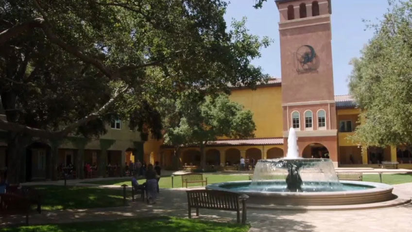Image of DreamWorks campus featuring a fountain and lush greenery.