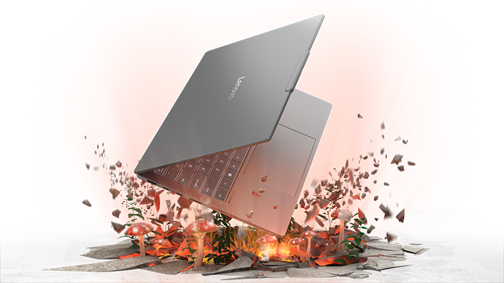 Un IdeaPad Pro 5 partiellement ouvert, entouré de brins de papier gris au-dessus d’une série de champignons rouges et oranges.
