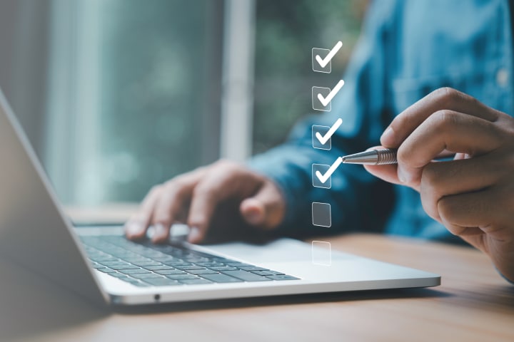 Man overlooking Cityscape with river