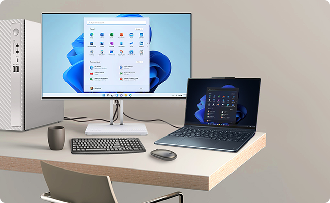 A laptop and desktop are connected to the monitor, demonstrating powerful USB-C connectivity.