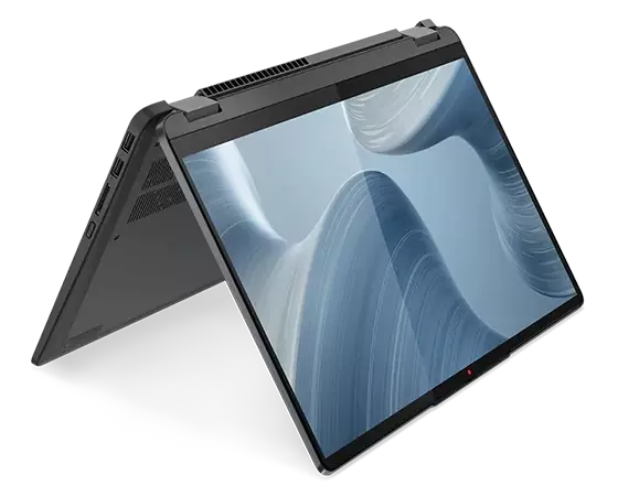 Angle view of the 14” IdeaPad Flex 5i in tent mode, with an OS panel against a swirling grey shape on the display