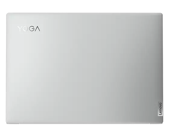 Vue de dessus du portable Yoga Slim 7 Pro Gen 7 (14" AMD) fermé, montrant le capot supérieur, ainsi que les logos Yoga et Lenovo