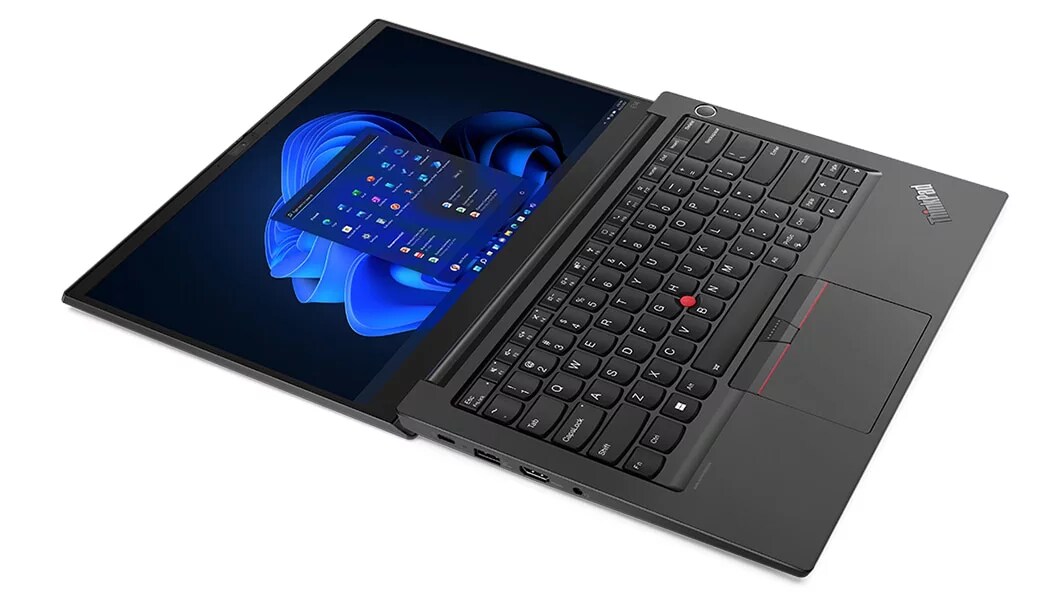  Aerial, left side view of Lenovo ThinkPad E14 Gen 4 (14, AMD) laptop, laid flat, opened 180 degrees, showing display and keyboard