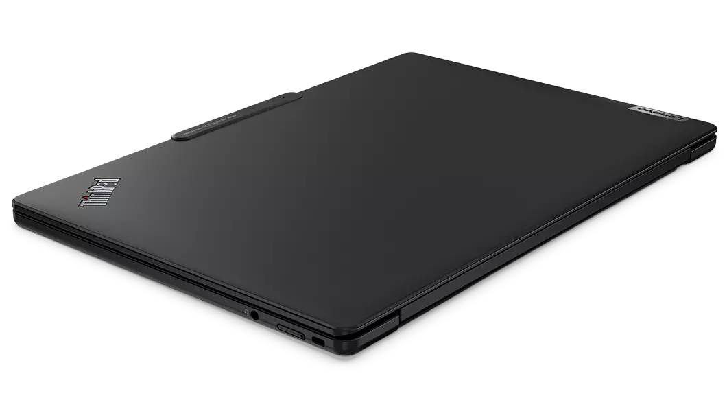 Closed cover on the Lenovo ThinkPad X13s laptop, angled to show left-side ports.