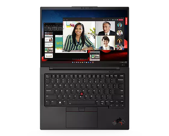 Overhead shot of Lenovo ThinkPad X1 Carbon Gen 11 laptop open 180 showing keyboard & video conference on the display.