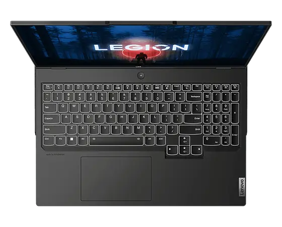 Vista desde la arriba del portátil para videojuegos Lenovo Legion Pro 7 de 8.ª generación [40,64 cm (16"), AMD] abierto, mostrando la parte superior de la pantalla con los logos de Legion y Lenovo y un teclado de tamaño completo