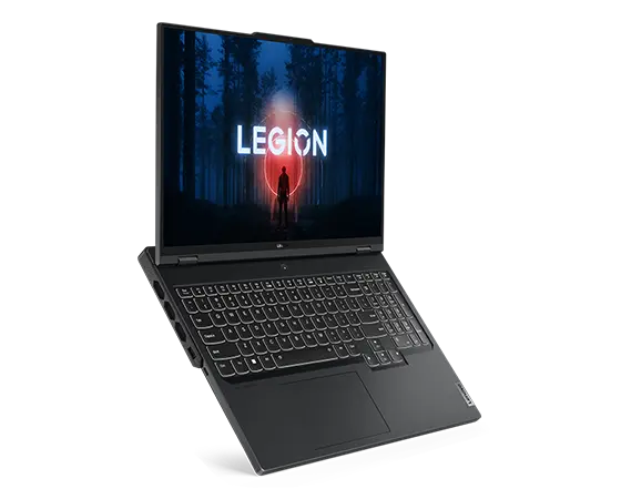 Vista lateral desde la derecha del portátil para videojuegos Lenovo Legion Pro 7 de 8.ª generación [40,64 cm (16"), AMD] abierto, mostrando la pantalla con el logo de Legion y la pantalla de inicio, el teclado y los puertos del lateral izquierdo
